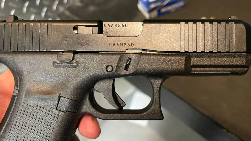 The Glock 19 Gen 5 has new features like a Glock Marksman Barrel, ambidextrous slide locks, and one trigger crossbar. Photo credit to Adam Campbell/Guns.com